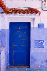 front door in blue town chefchaouen, morocco