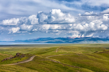 Cyclists in the high mountain valley