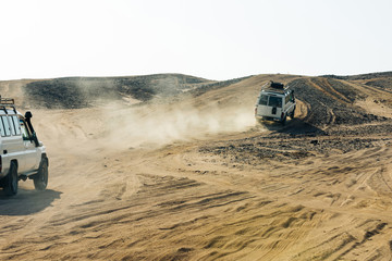 Cars racing in desert