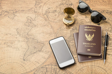 Planning travel concept, Thailand passport on old map