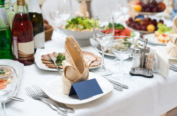 Served table in restaurant or cafe, salads, fruits and vegetables