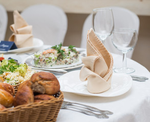 Served table in restaurant or cafe, salads, fruits and vegetables