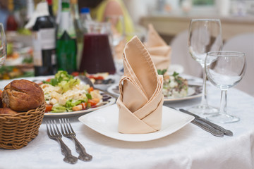 Served table in restaurant or cafe, salads, fruits and vegetables