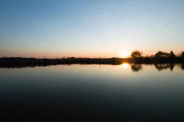 Fototapeta na wymiar Sunset lake and beautiful scenery landscape concept