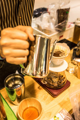 Filtered coffee, or pour-over is a method that involves pouring water over roasted, ground coffee beans contained in a filter