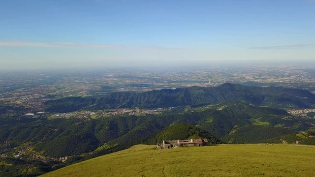 Great landscape on the Padana plain in summer time. Panorama from Linzone Mountain, Bergamo, Italy. 