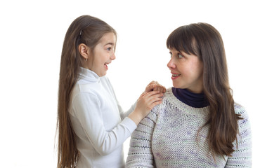 funny mother with her little daughter laughing