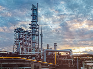 View of the petrochemical industrial plant against the background of the evening sky