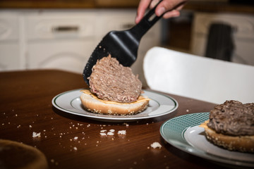 Fresh burger closeup on wooden rustic table