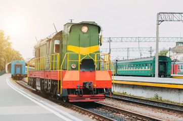 Fototapeta na wymiar Train, shunting locomotive on the passenger platform