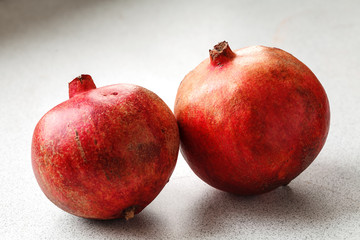 ripe red pomegranate closeup. 