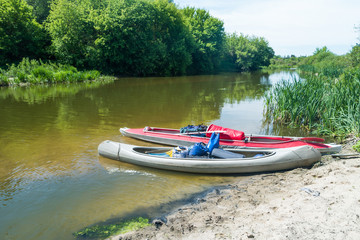 Fototapeta na wymiar Two kayaks standing in water
