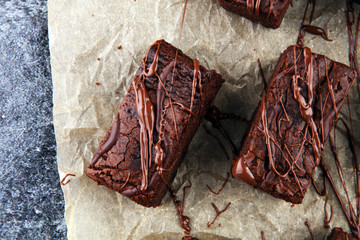 homemade chocolate brownies on grey vintage background, chocolate cake concept