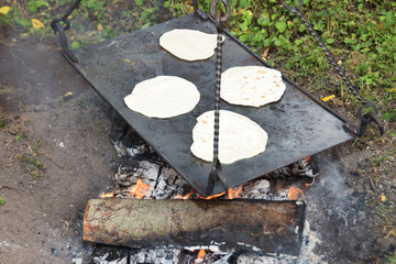 Grilled pastry over the fire