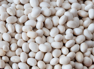 Raw haricot bean. White beans grain background