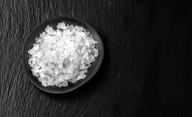 white salt on black