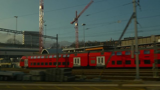 sunset light zurich suburb road trip train panorama 4k switzerland
