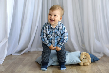 Fototapeta premium Joyfull little one boy is happy and excited 