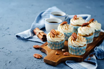 Gordijnen Carrot cinnamon cupcakes with pecan © nata_vkusidey