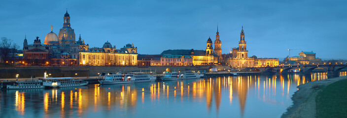 Night panorama of Dresden Old town with reflections in Elbe river