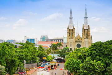 Jakarta, Santa Ursula christian cathedral, Indonesia city view. - obrazy, fototapety, plakaty