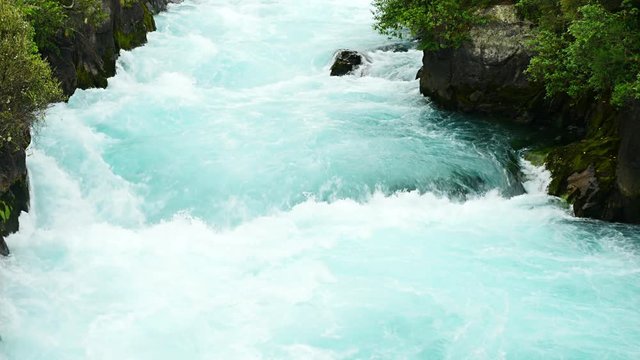 Rough river rapids in the Wailato River on the North Island of New Zealand.