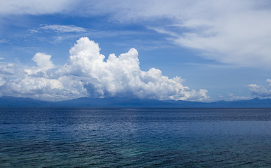 Obraz premium Sea panorama with clouds. Cloudy seascape. Tropical seaside minimal photo.