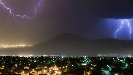 Zelfklevend Fotobehang Lightning and rain storm over east Henderson and Las Vegas, NV © C.A.Palmira Photos