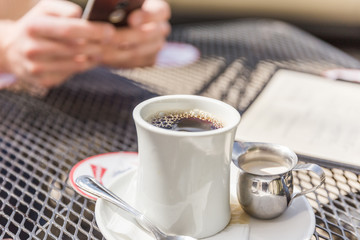 Coffee and Cream on Patio Table