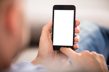 Close-up Of A Hand Holding Cell Phone