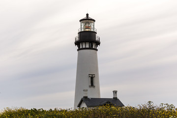 Lighthouse Against Soft Cloudy Sky