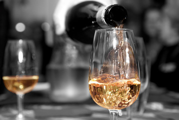 Serving white wine balck and white background