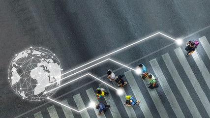 the concept art of world has social network connect the busy city people walk to pedestrian crosswalk on business traffic road (Aerial photo, top view) 