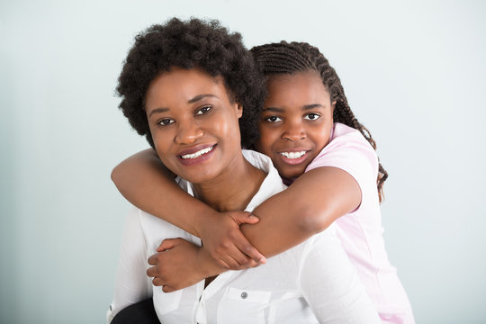 Portrait Of Happy Mother And Daughter
