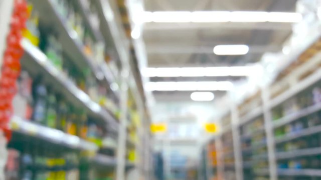 Camera motion along blurred supermarket shelves