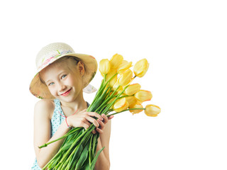 Beautiful girl with a bouquet of yellow tulips.