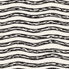 Decorative seamless pattern with handdrawn doodle lines. Hand painted grungy wavy stripes background. Trendy freehand texture 