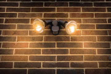 Flood light on external brick wall daytime look up