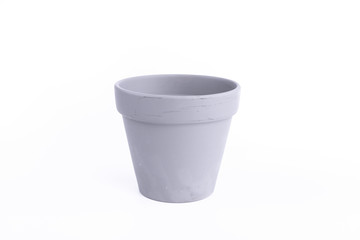 A light grey clay flower pot isolated on white background.