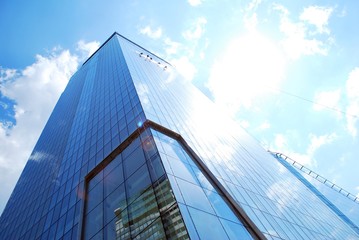 Fototapeta na wymiar Modern building.Modern office building with facade of glass