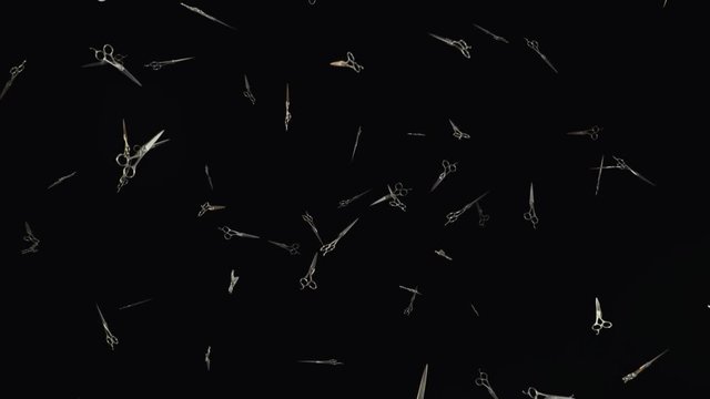 Looping 3d animation featuring falling chrome hairdressers scissors against a dark background.

