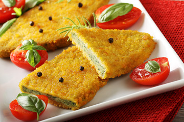 Spinach cutlets with tomato salad
