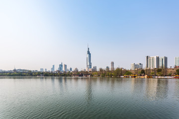 Fototapeta na wymiar City Skyline By River Against Sky in city of China.