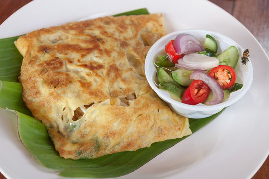 Thailand muslim food Martabak or murtabak, stuffed bread, eat with acar.