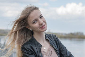 Girl with blond hair on the promenade