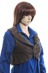 Mannequin in a bright blue blouse and waistcoat