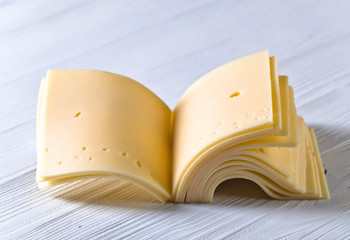 Slices of cheese folded like a book