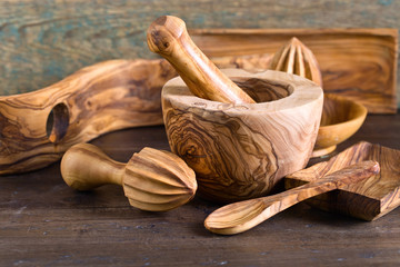Set of wooden kitchen utensils .