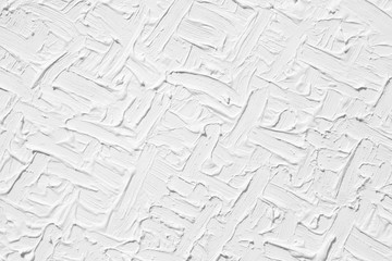 Texture of white color with a natural pattern. The background is painted with colors with a volumetric pattern.