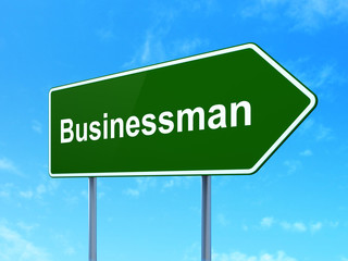 Business concept: Businessman on road sign background